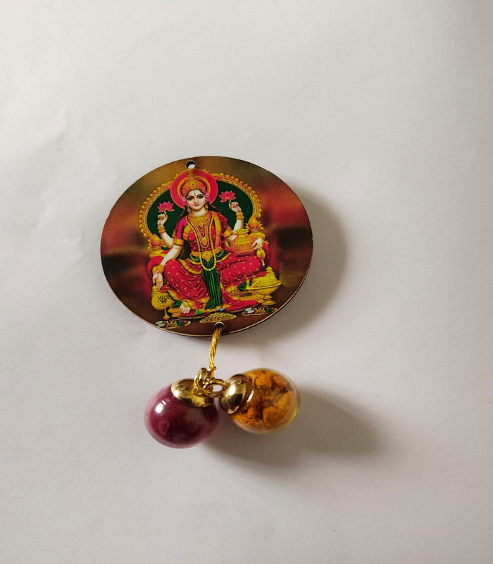 Lakshmi with magnet and haldi kumkum